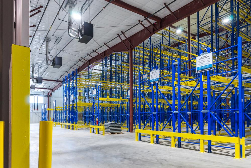 Towards Maximum Efficiency: A Racking System Tailored for Autonomous Forklifts at Massilly