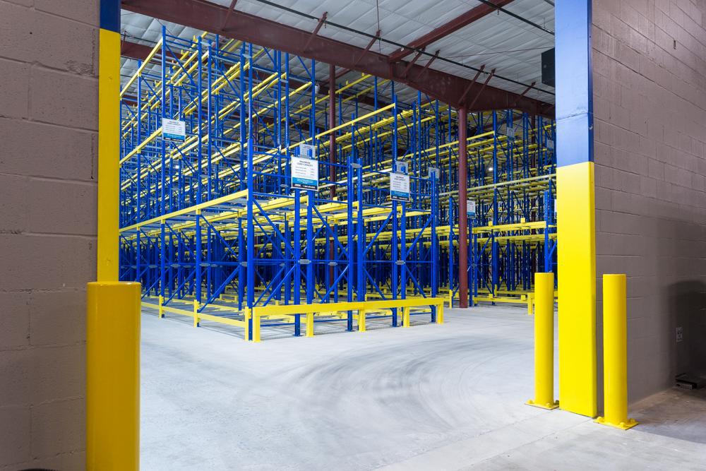 Towards Maximum Efficiency: A Racking System Tailored for Autonomous Forklifts at Massilly